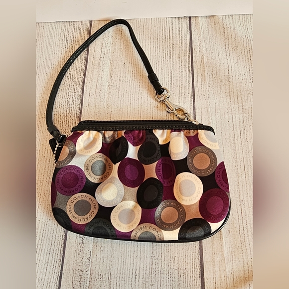 Coach Handbags - Coach Madison Op Art Wristlet in Purple, Black, Cream and Tan